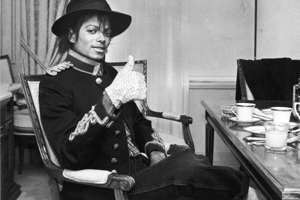 February 7th, 1984. Michael Jackson relaxing in his hotel room prior to attending a party being held in his honor at the Museum of Natural History.